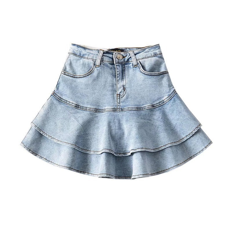 Light blue high-waisted tiered denim mini skirt with a ruffle hem and A-line silhouette