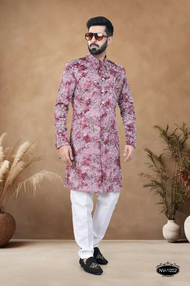 Men wearing a pink suede Indo-Western kurta set with detailed thread and sequence embroidery