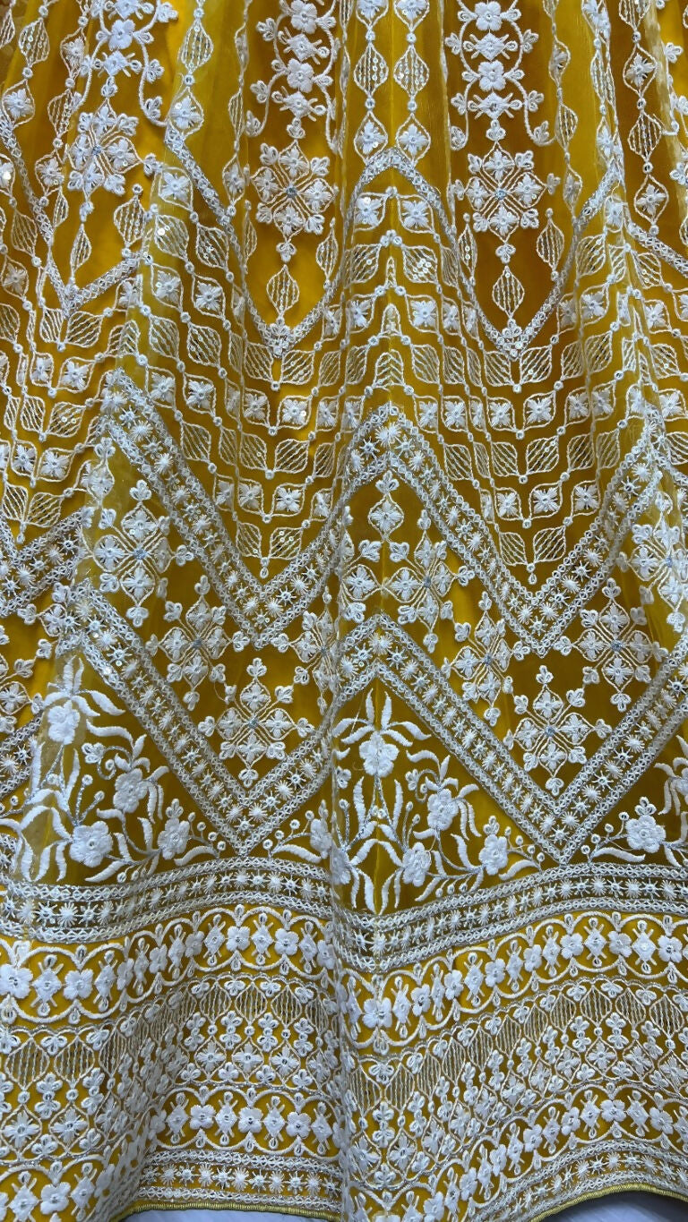 Yellow Net Wedding Lehenga Choli with Sequins and Thread Embroidery