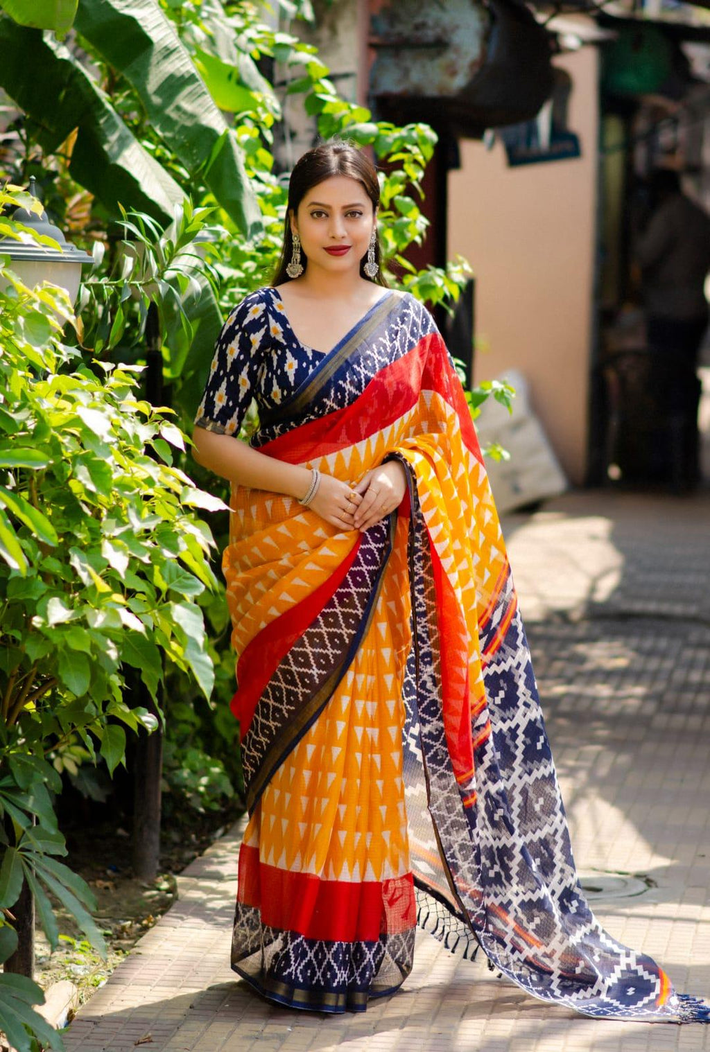 Yellow polycotton ikkat print saree with zari pattu border and zalar pallu