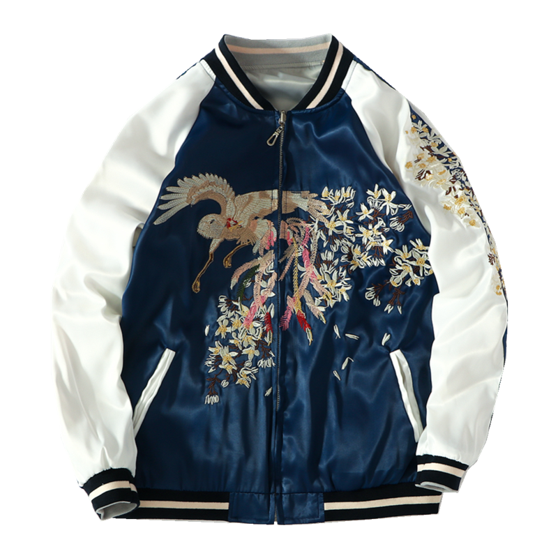 Women's Harajuku style baseball jacket in navy blue and white with intricate phoenix and floral embroidery on front and back, featuring ribbed collar, cuffs, and hem, and a full zip closure.