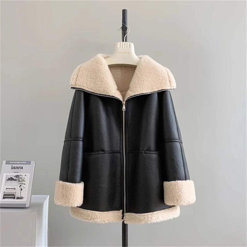 Women's Classic Black faux leather jacket with plush cream faux fur collar, cuffs, and hem, hanging on a display stand.