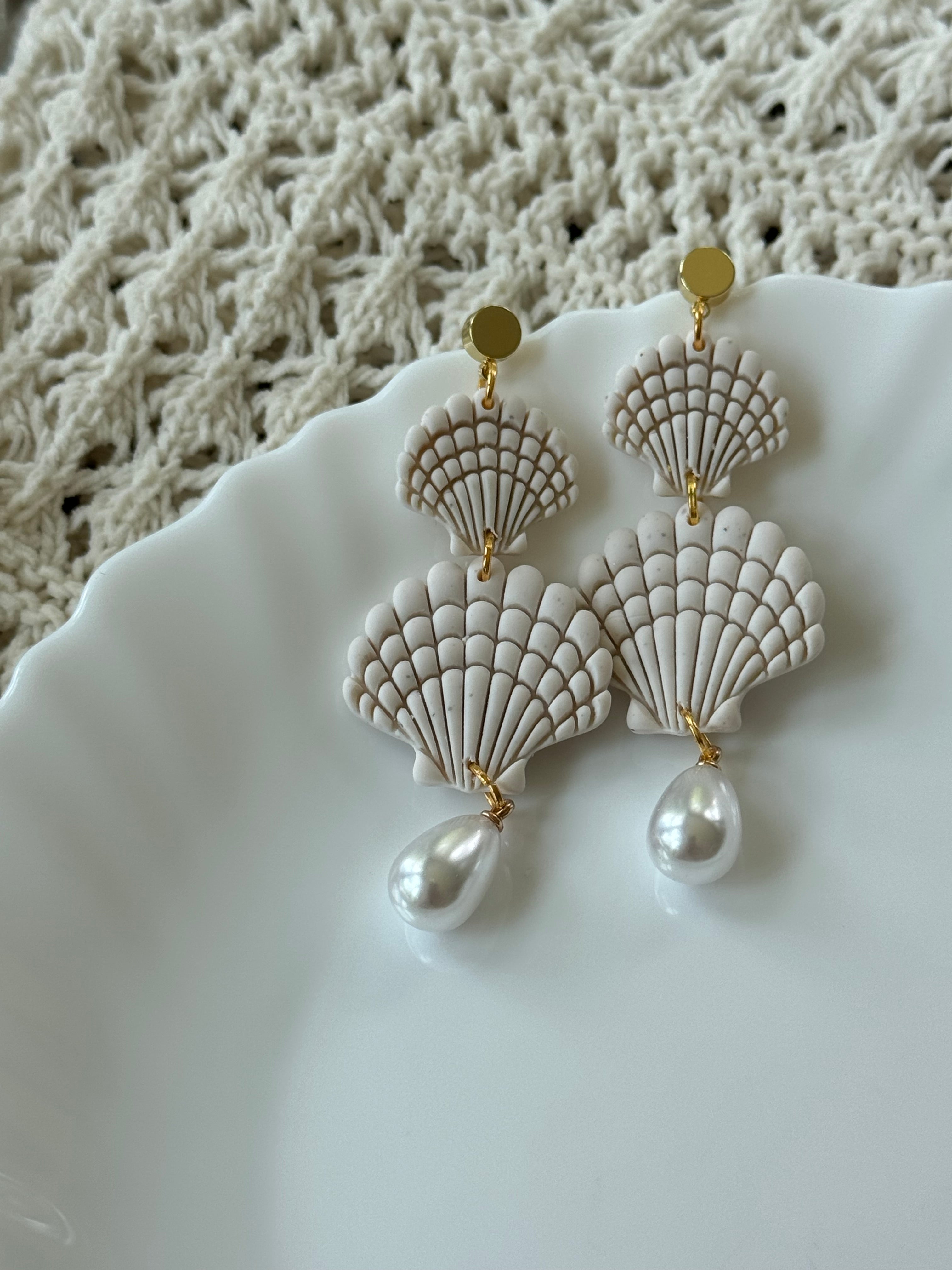 Handcrafted Shelley earrings in Dove white polymer clay with gold accents
