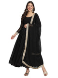Elegant black Anarkali set featuring intricate gota work on flowing georgette fabric