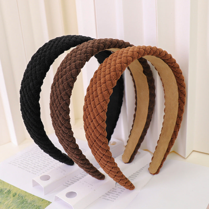 Assortment of comfortable wide corduroy headbands in various colors including black, brown, pink, white, and cream, displayed on a white surface.