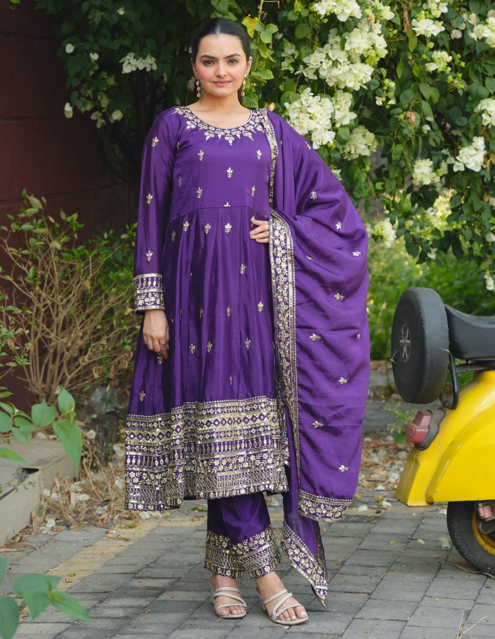 Violet Chinon silk designer Anarkali suit with heavy sequence embroidery work.