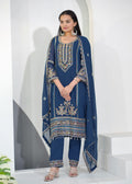 Woman wearing a blue Fox Georgette salwar suit with sequence embroidery and lace border