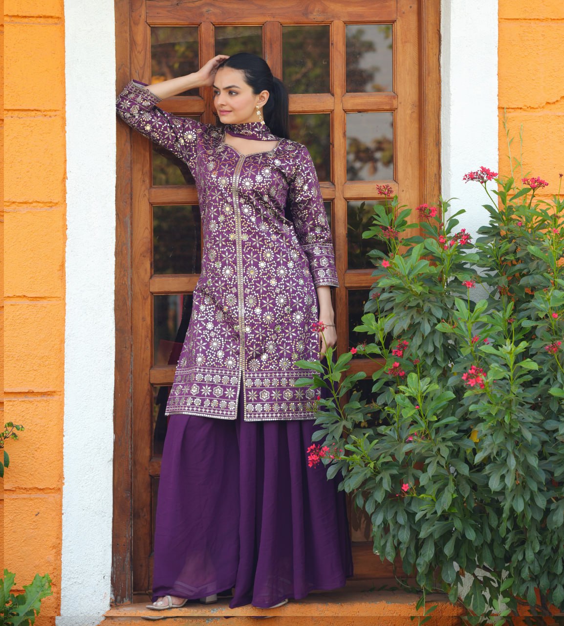 Purple Tapeta Silk sharara suit with mirror work embroidery and Georgette dupatta