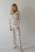 Woman wearing matching long sleeve button-front bamboo pajama set in Camo 2.0 print
