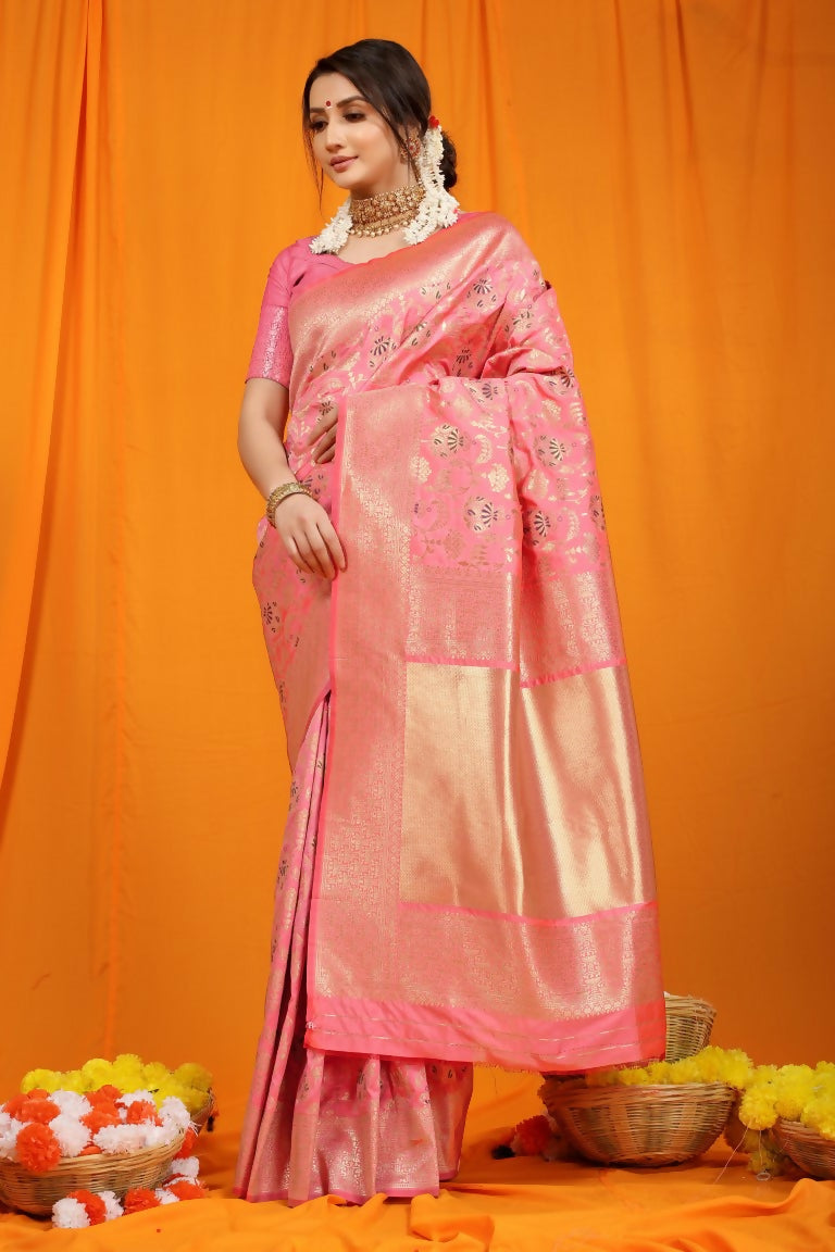 Pink Kanjivaram silk saree with Zari woven patterns and matching blouse