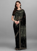 Elegant black georgette saree with heavy sequence embroidery and matching blouse