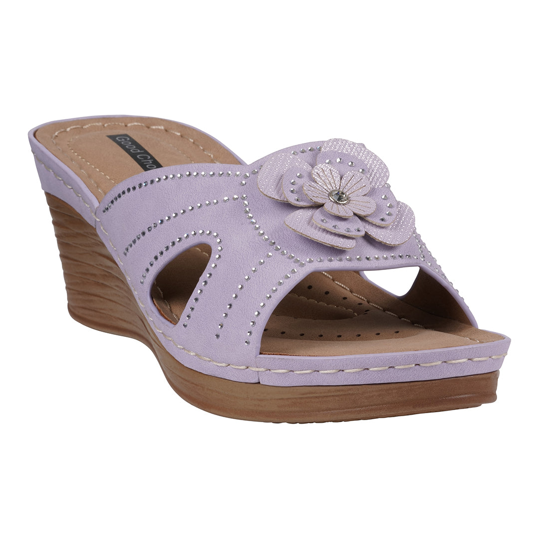 Women's Fiora Lilac Floral Wedge Sandals featuring a cutout design and floral embellishment.