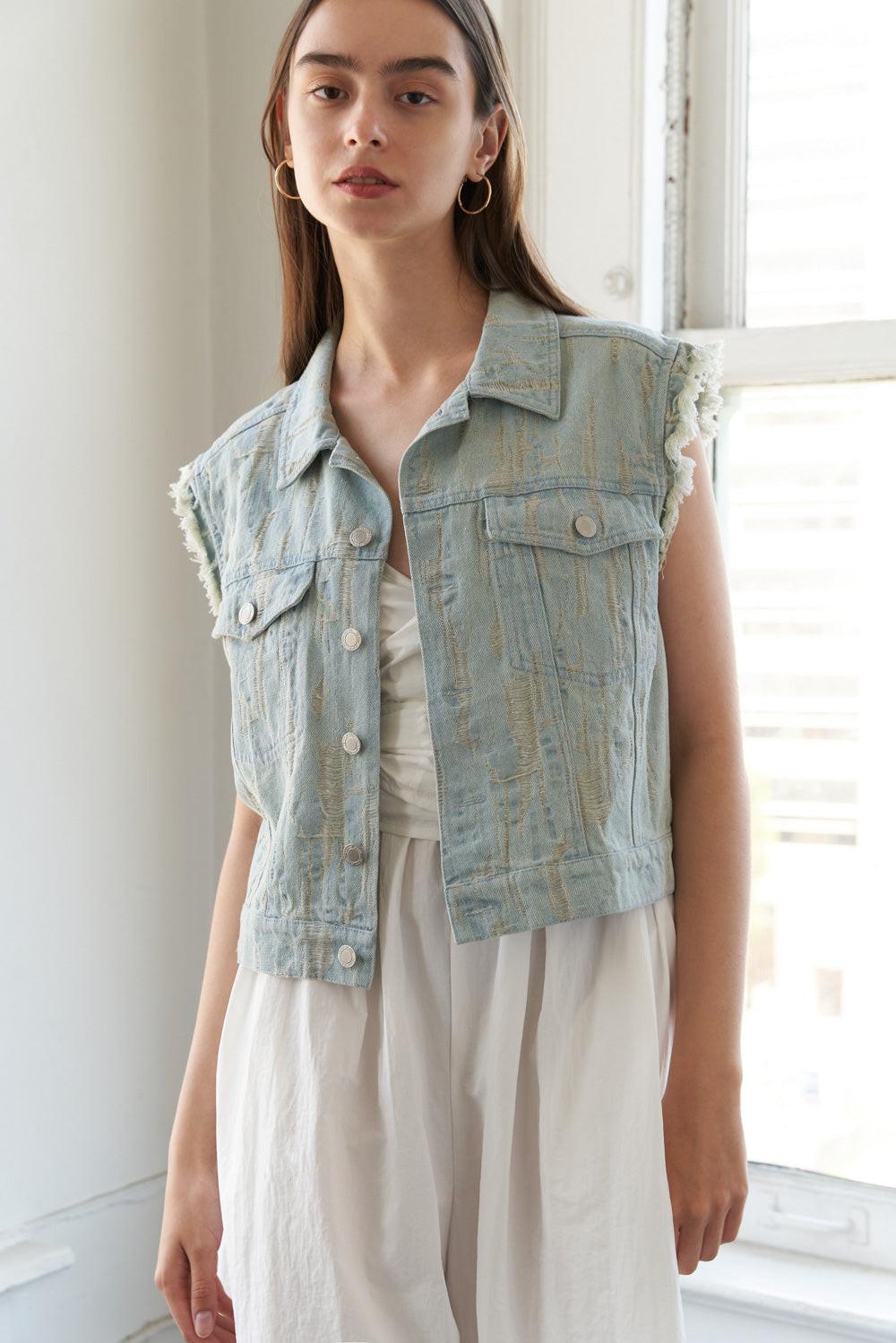 Distressed Light Wash Denim Vest with Raw Edge Armholes