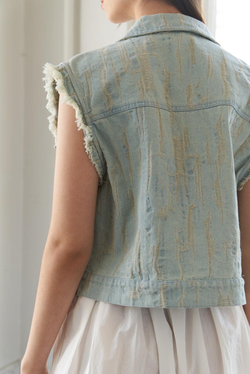 Distressed Light Wash Denim Vest with Raw Edge Armholes