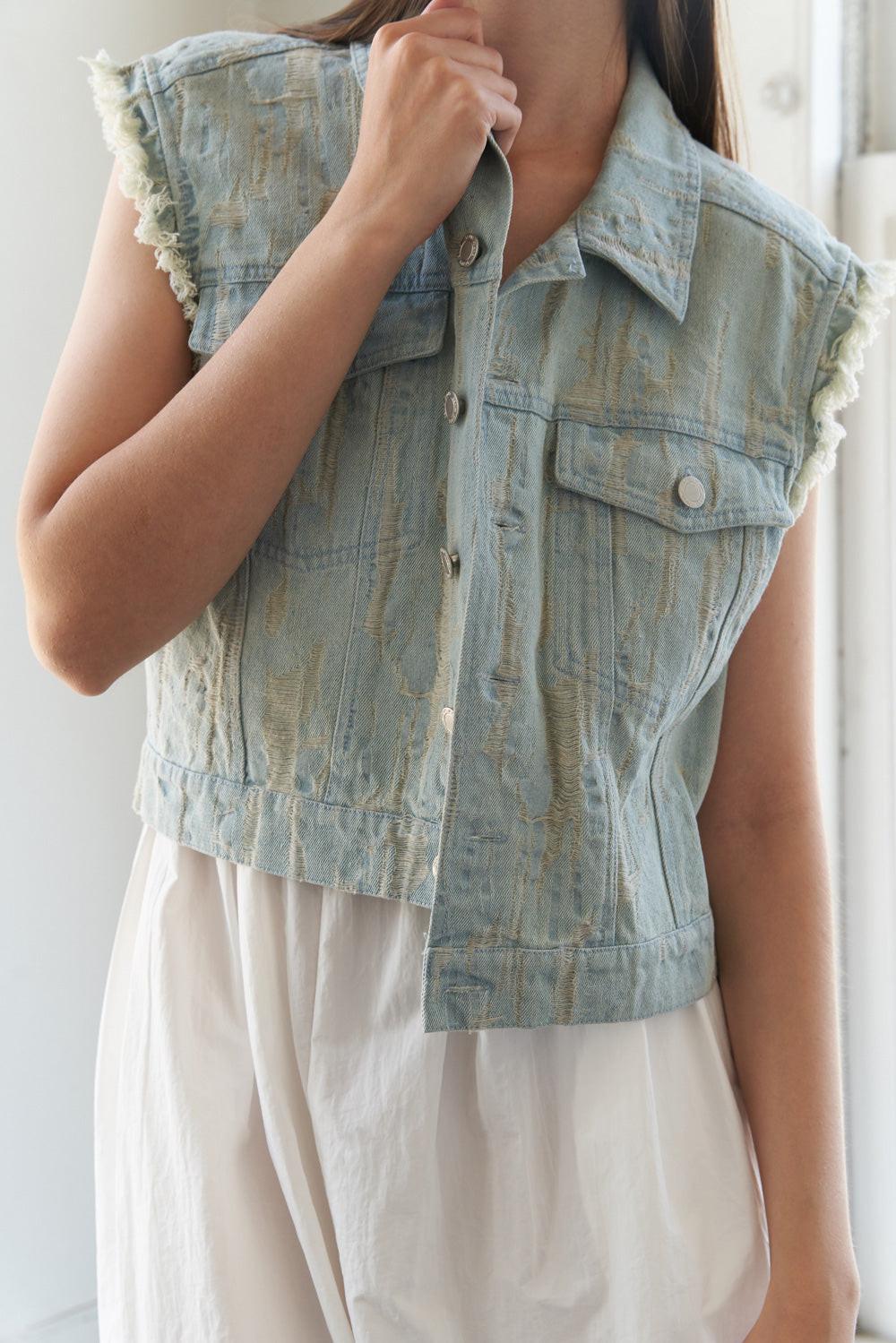 Distressed Light Wash Denim Vest with Raw Edge Armholes