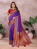 Purple Kalamkari silk saree with intricate weaving and traditional patterns