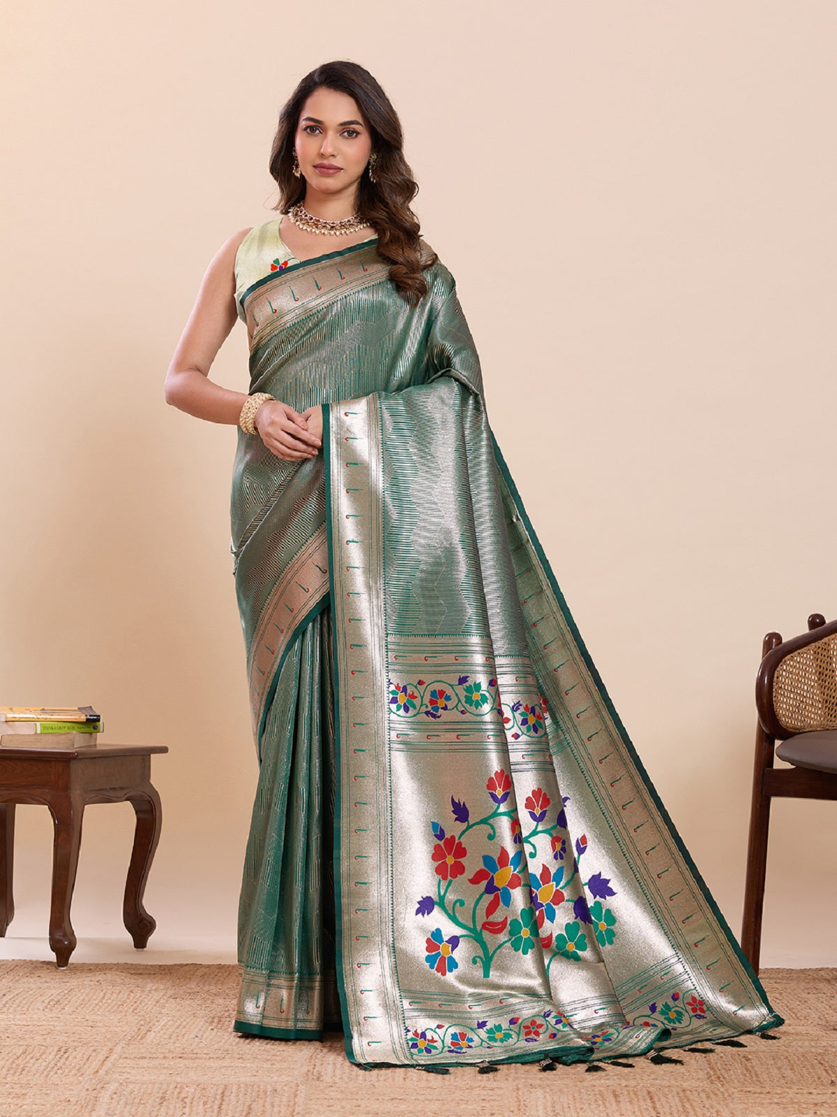 Green pure soft silk saree with intricate woven lotus motifs.
