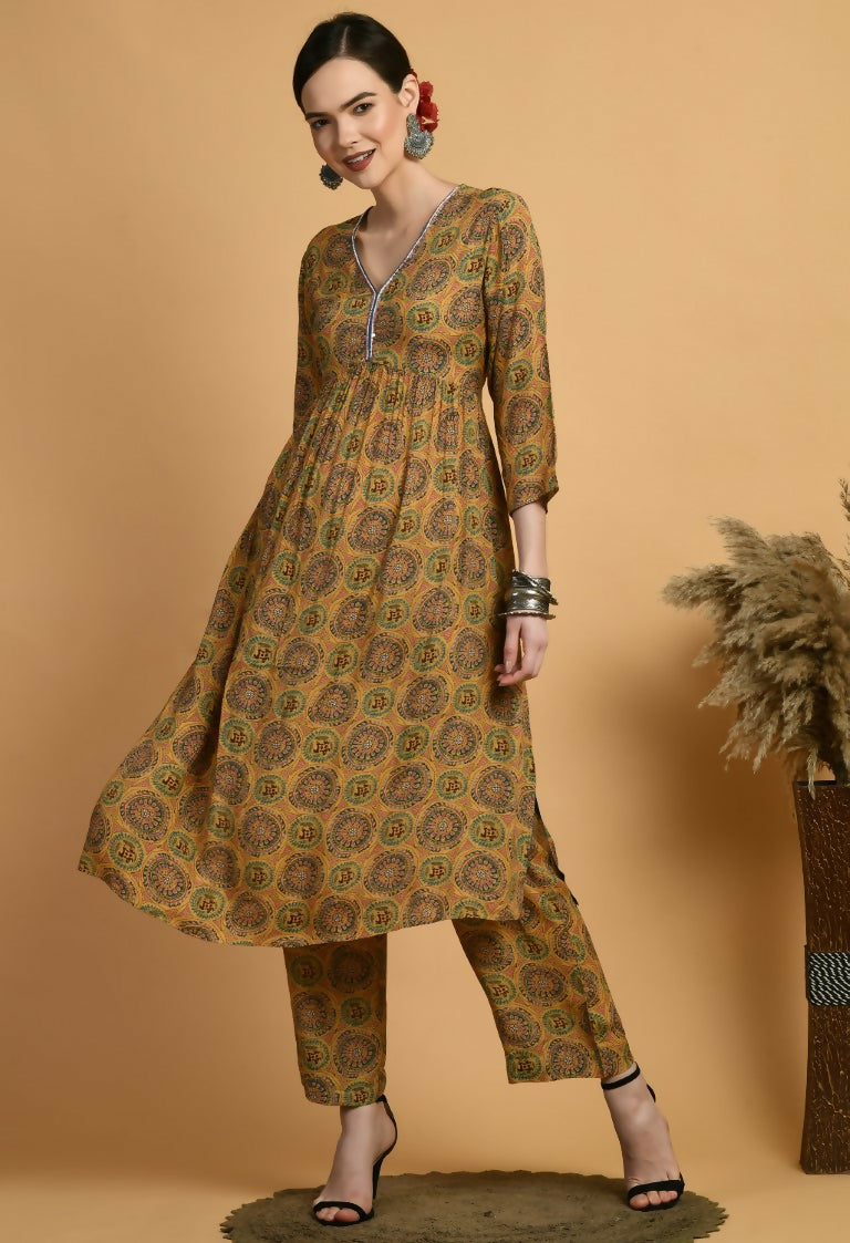 Woman wearing a mustard maslin 2-piece kurta set