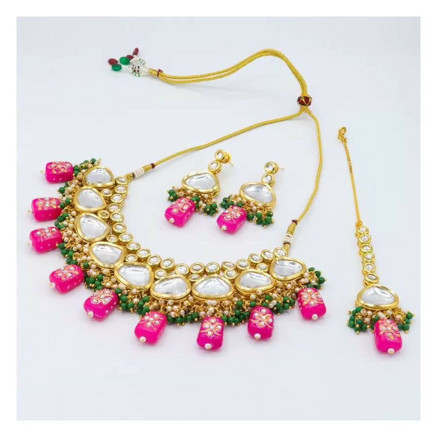 Pink Kundan stone necklace set with gold-plated finish and adjustable cord