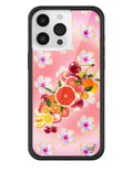 iPhone case featuring a colorful pattern of tropical fruits and flowers on a pink background with a black protective bumper.