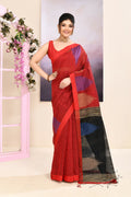 Maroon cotton blend Jamdani saree with a decorative temple border draped elegantly