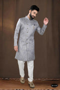 A stylish grey woven jacquard kurta paired with white pyjamas for boys