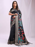 Elegant black linen cotton saree with matching blouse piece draped gracefully