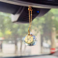 Gold-plated zodiac charm with round-cut crystal hanging on a bead chain, designed for a car rearview mirror.