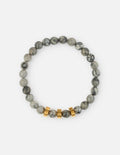 A Faith Hope Love bracelet featuring grey marbled beads and gold accents on a clean background.