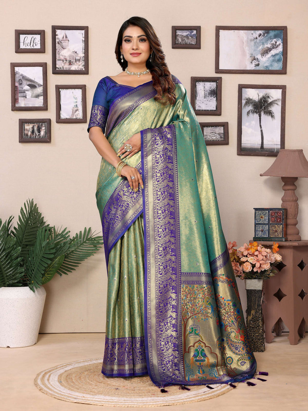 A green tissue silk saree featuring intricate weaving and a subtle, luxurious sheen.