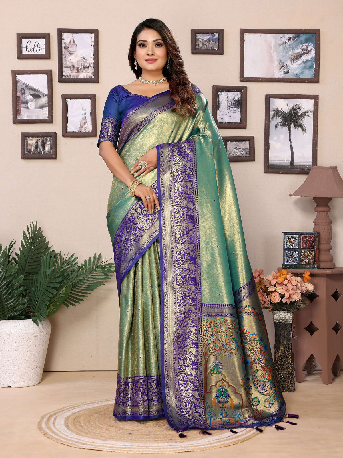 A green tissue silk saree featuring intricate weaving and a subtle, luxurious sheen.