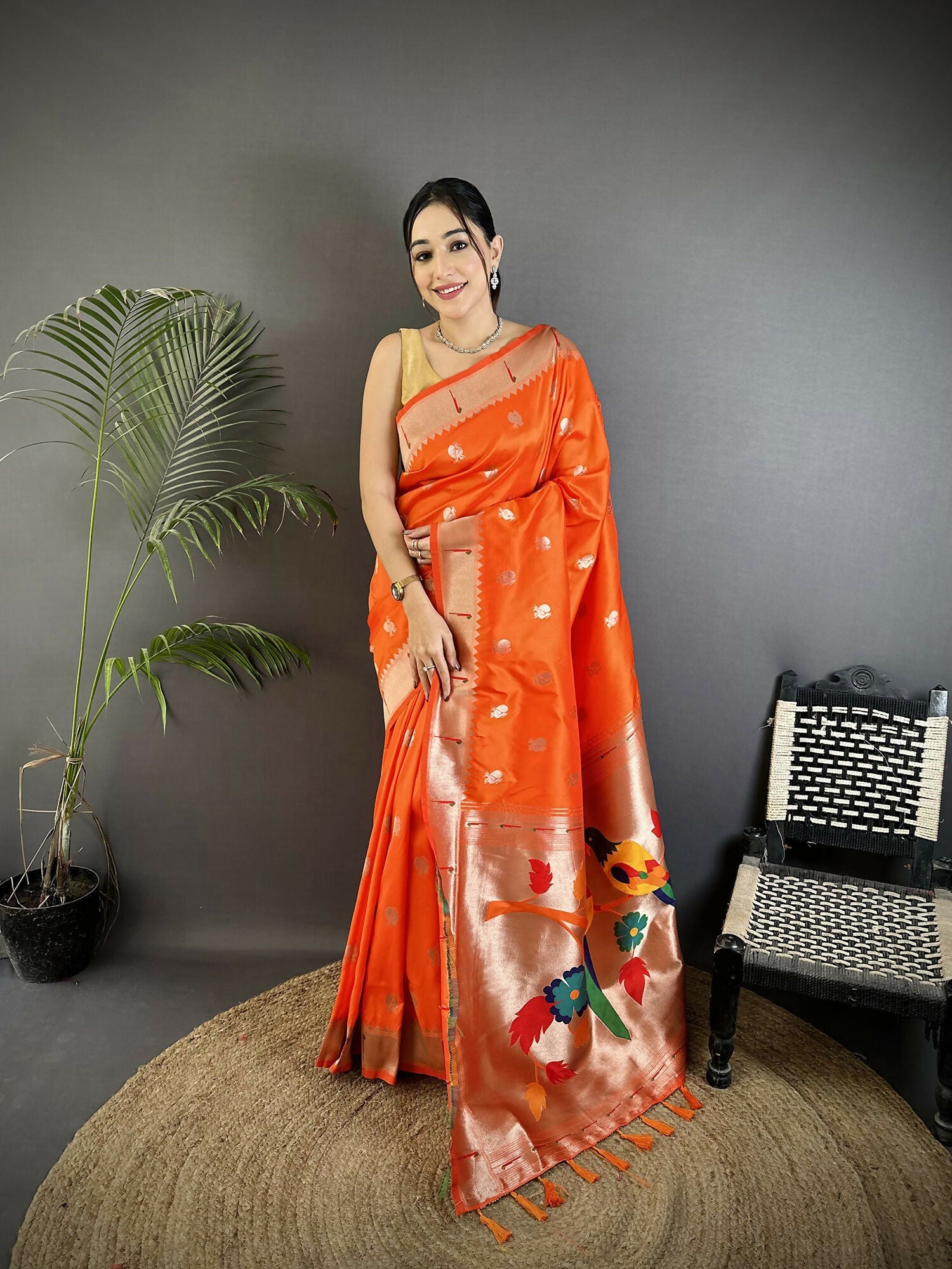 Orange peacock and floral motif soft silk Kanchipuram saree