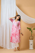 Woman wearing a Pink Tie & Dye Cotton Kurta Pant Set from Joban Fashion