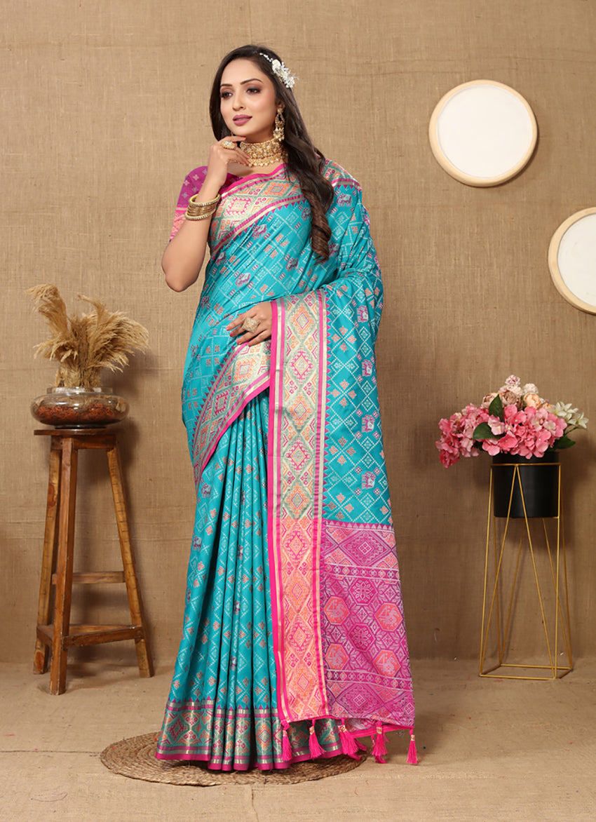 Firozi Patola silk saree with gold and magenta Zari Meenakari weaving motifs