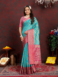 Firozi organza silk saree with geometric woven patterns and a rich Meenakari pallu in pink and gold