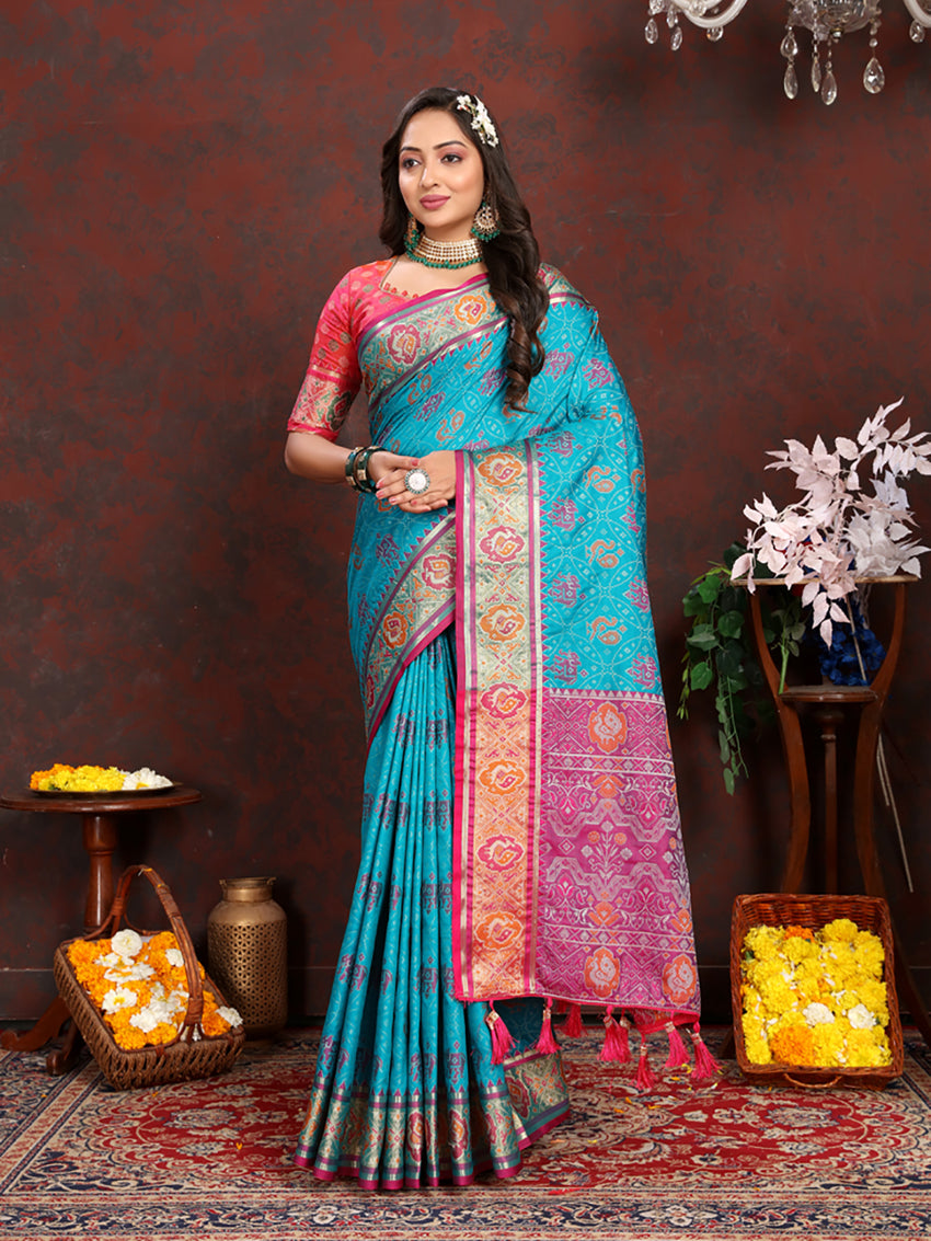 Turquoise Firozi Patola silk saree with Zari Meenakari weaving motifs and gold accents