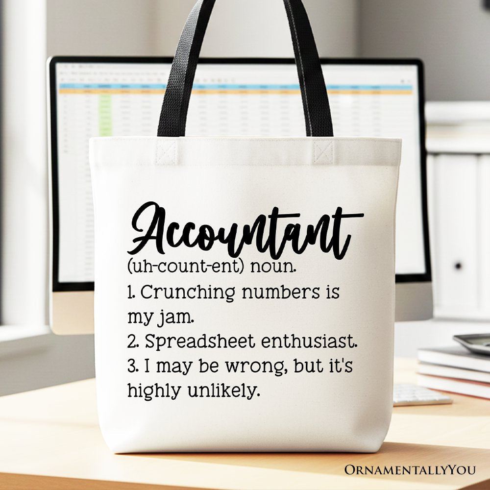 A white and black canvas tote bag featuring a dictionary-style definition of an accountant.
