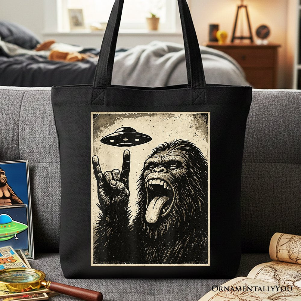 Black and cream Bigfoot UFO graphic cotton tote bag for streetwear style.