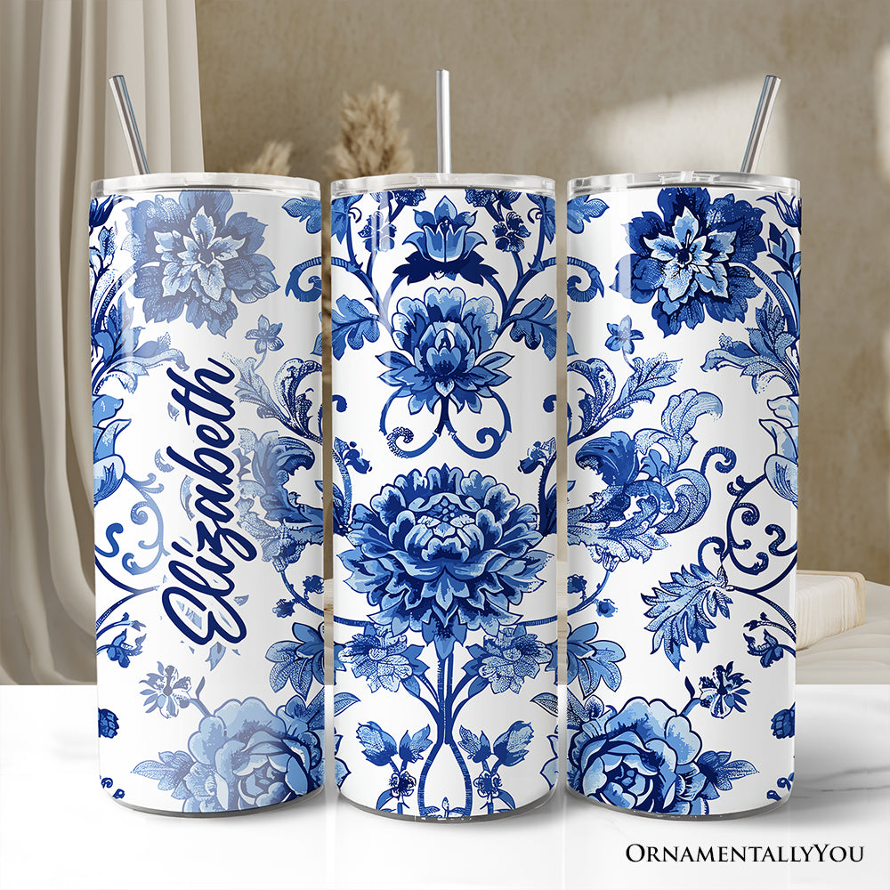 20oz stainless steel tumbler featuring a blue and white Chinoiserie-style floral pattern, includes lid and straw.