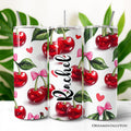 Personalized 20oz stainless steel tumbler with cherry and pink bow pattern on a white background.
