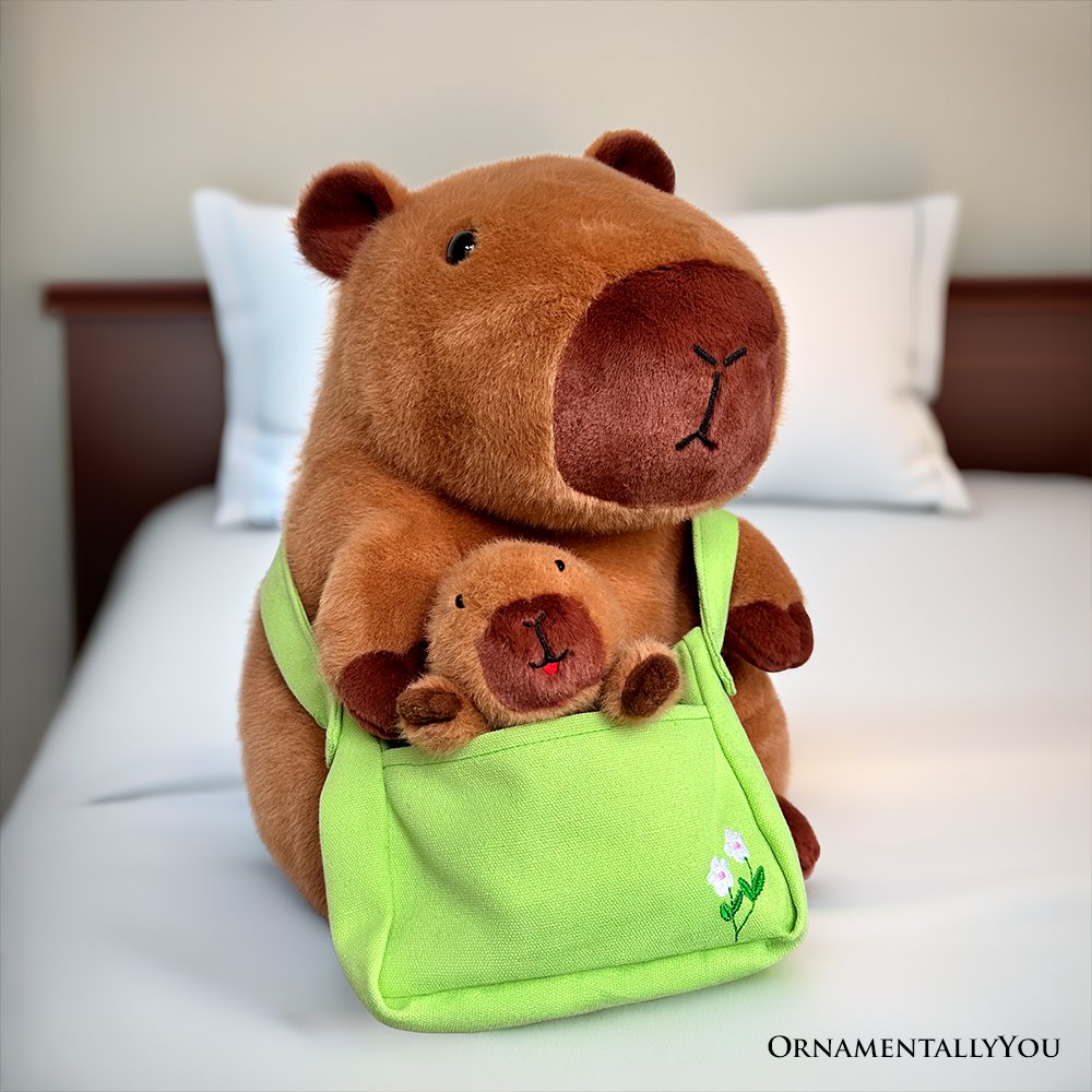 12-inch mama capybara plushie with a matching baby in a green pouch, brown and light-green color scheme.