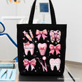 Dental Squad canvas tote bag with pink teeth and bow graphic, pink aesthetic shopper