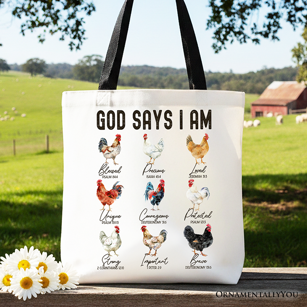A durable canvas-style tote bag featuring a rooster and chicken design with the text 'God Says I Am' in a farmhouse aesthetic.