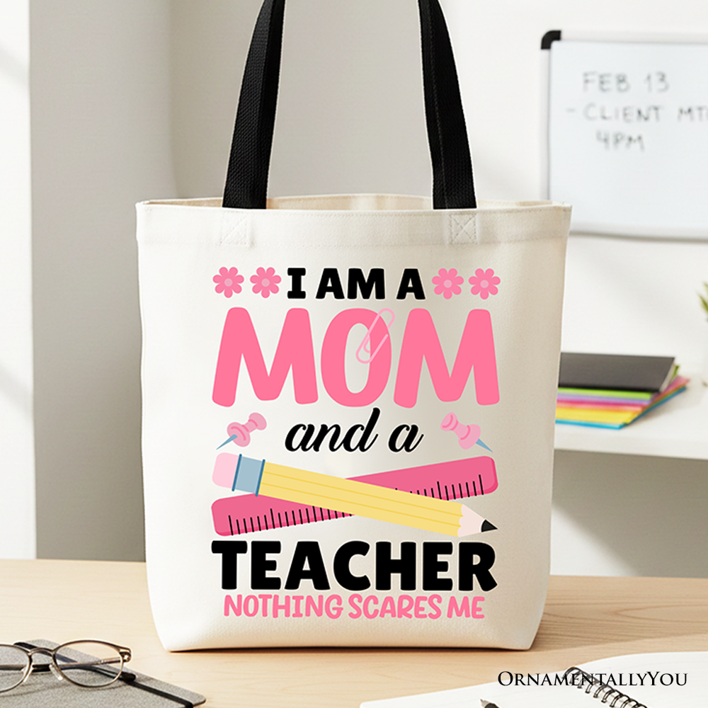 Off-white and black cotton tote bag with the text 'I Am a Mom and a Teacher Nothing Scares Me'.