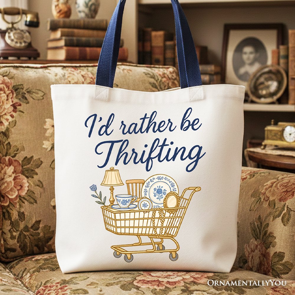 White canvas tote bag with 'I'd Rather Be Thrifting' text in blue.