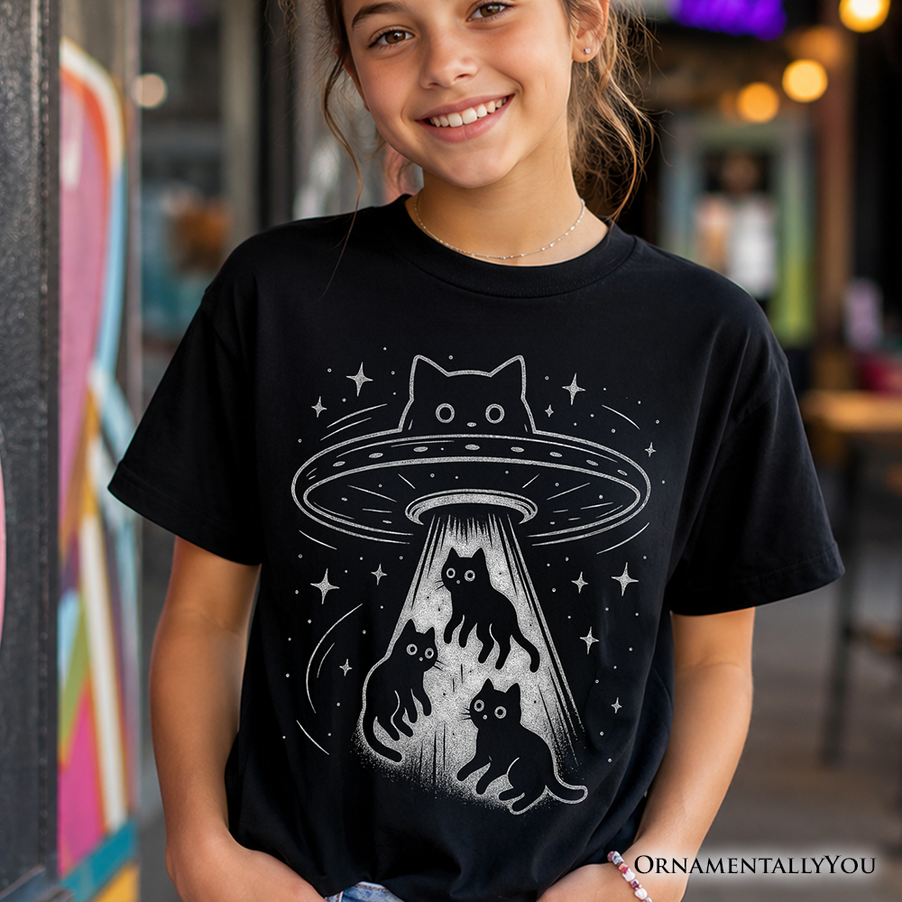 Child wearing a funny Alien Cat Abduction space graphic t-shirt