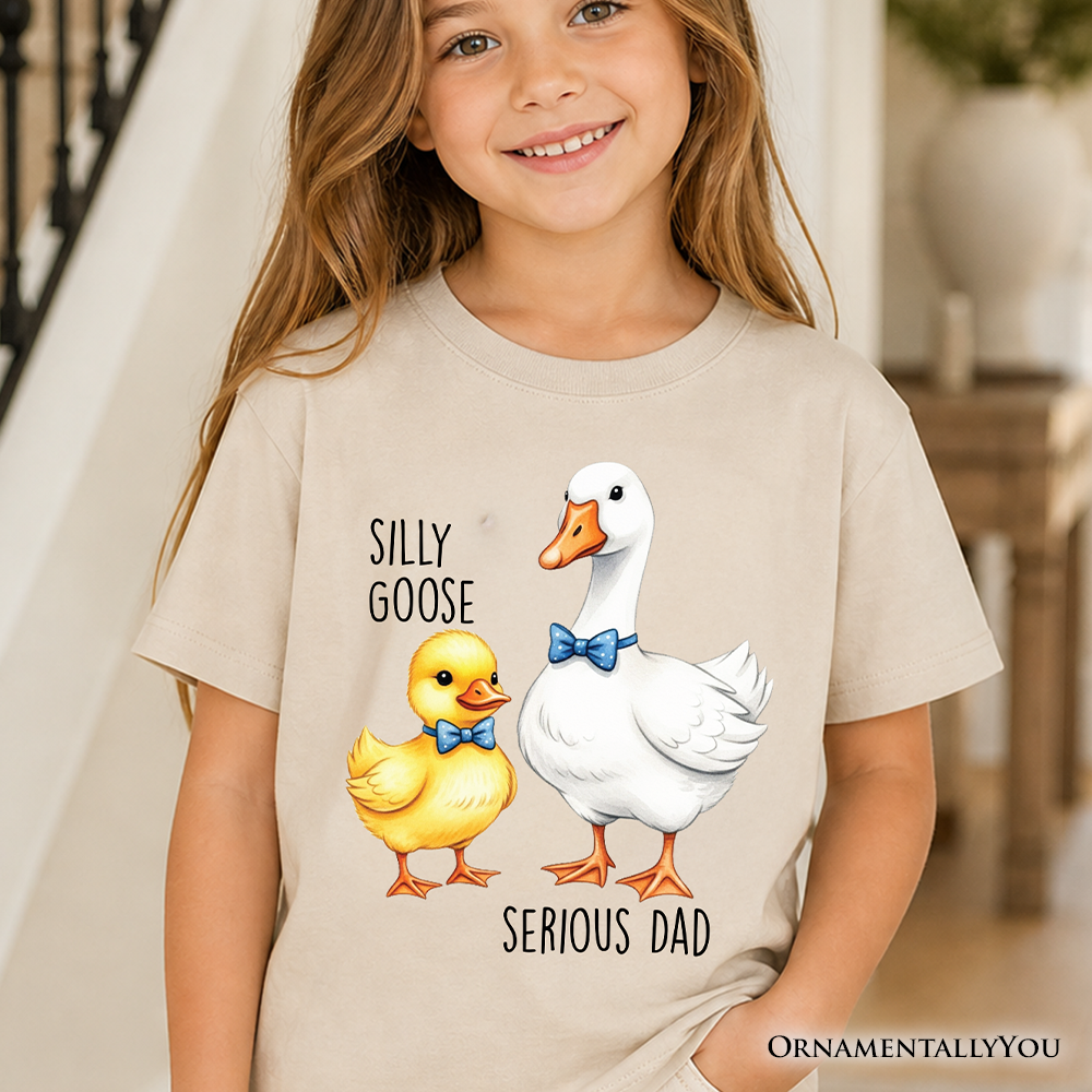 Kids wearing a Silly Goose Serious Dad graphic t-shirt in beige, white, and grey colorways.
