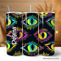 20oz stainless steel tumbler with neon-yellow, pink, and blue abstract evil eye design on matte black background.