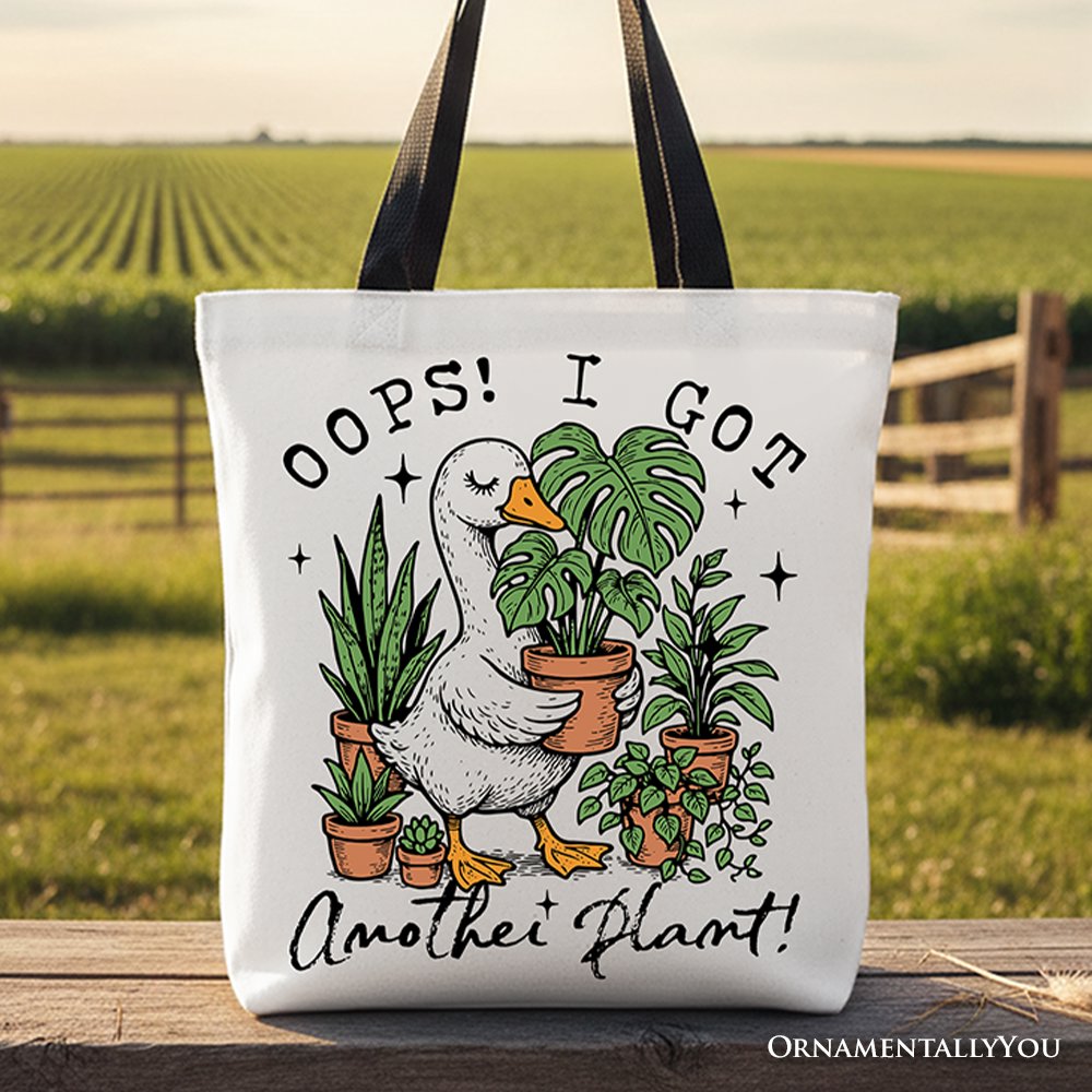 Oops I Got Another Plant goose themed canvas tote bag in white and black.
