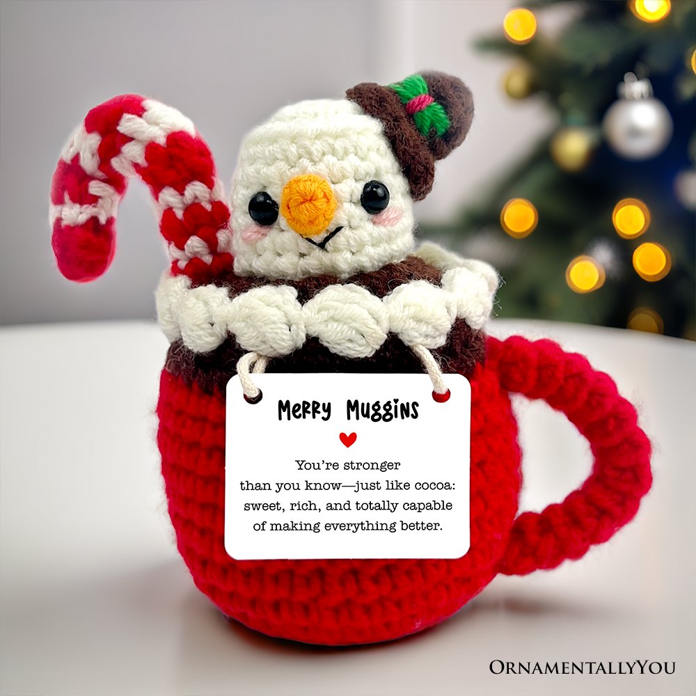 Handcrafted crochet hot cocoa marshmallow support doll in red, white, and brown for Christmas decor.